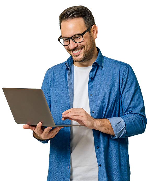 Smiling man holding laptop
